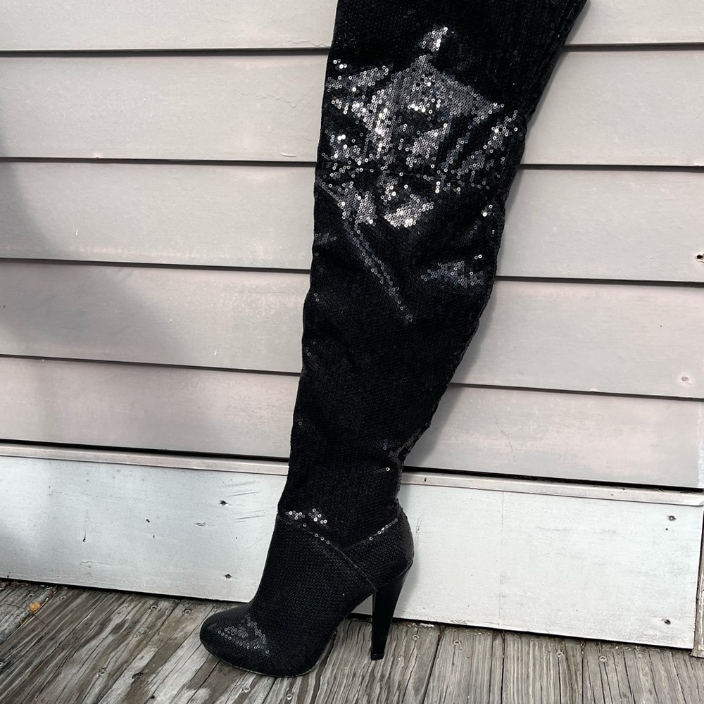 Over the knee black sequin boot.